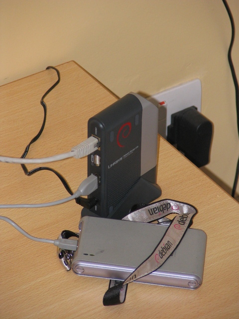 A NSLU2 and a USB disk from the back
